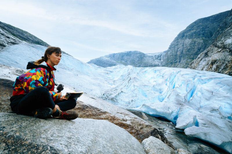 Anne Sophie Balzer sitting on the ice of the Jostedalsbreen