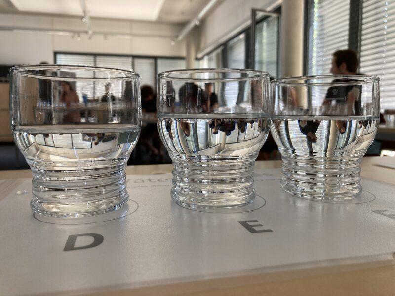 Three glasses of water standing on a table